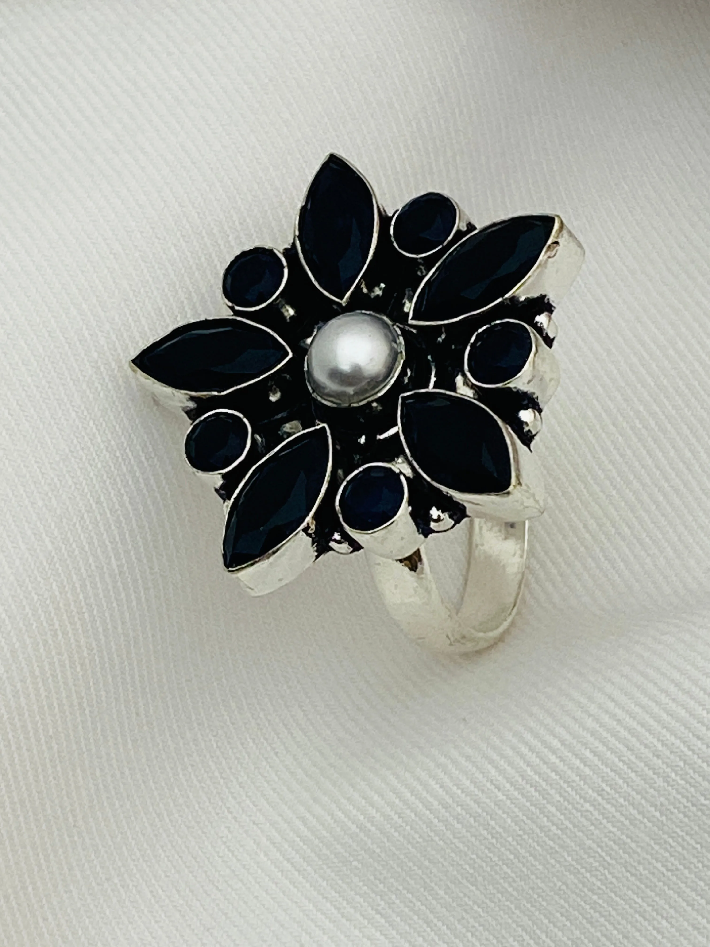 Alluring Black Stone Studded Floral Designed Adjustable Rings With Pearl Bead