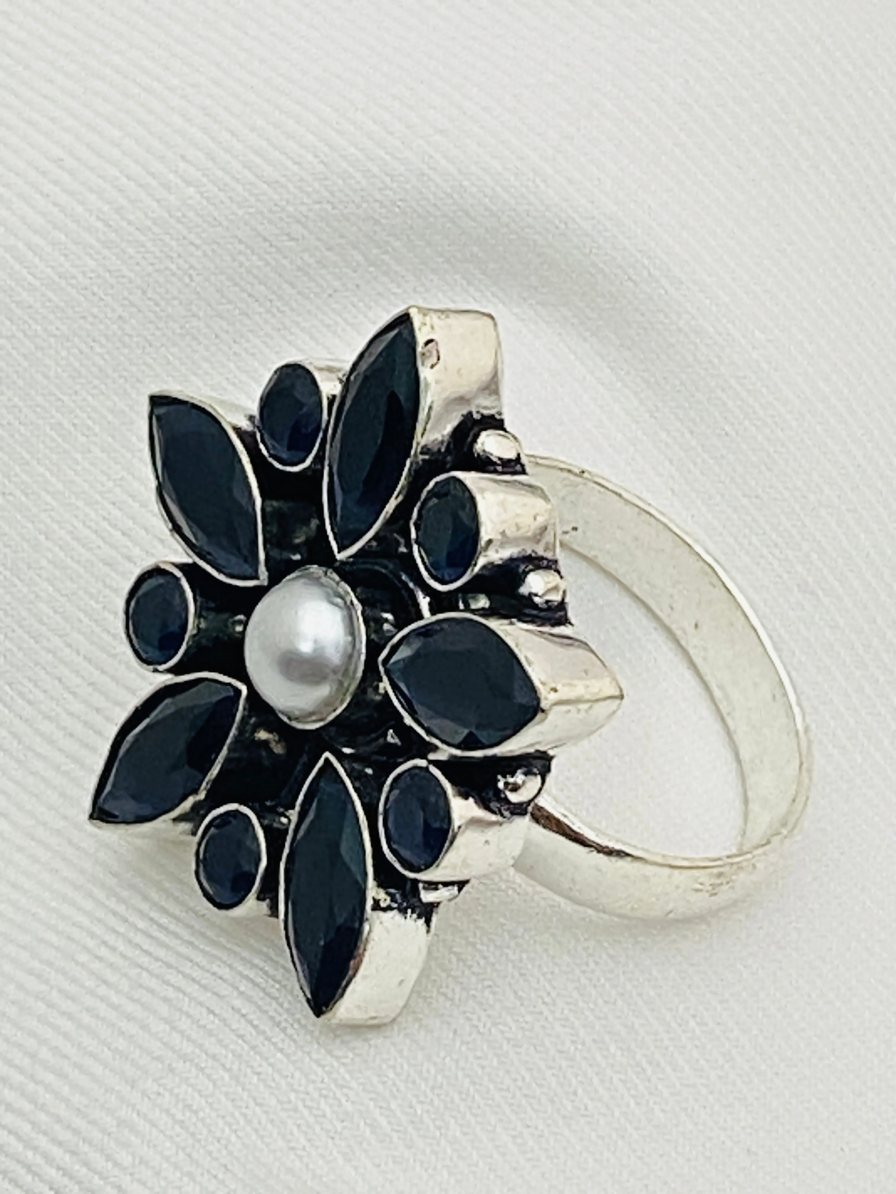 Alluring Black Stone Studded Floral Designed Adjustable Rings With Pearl Bead