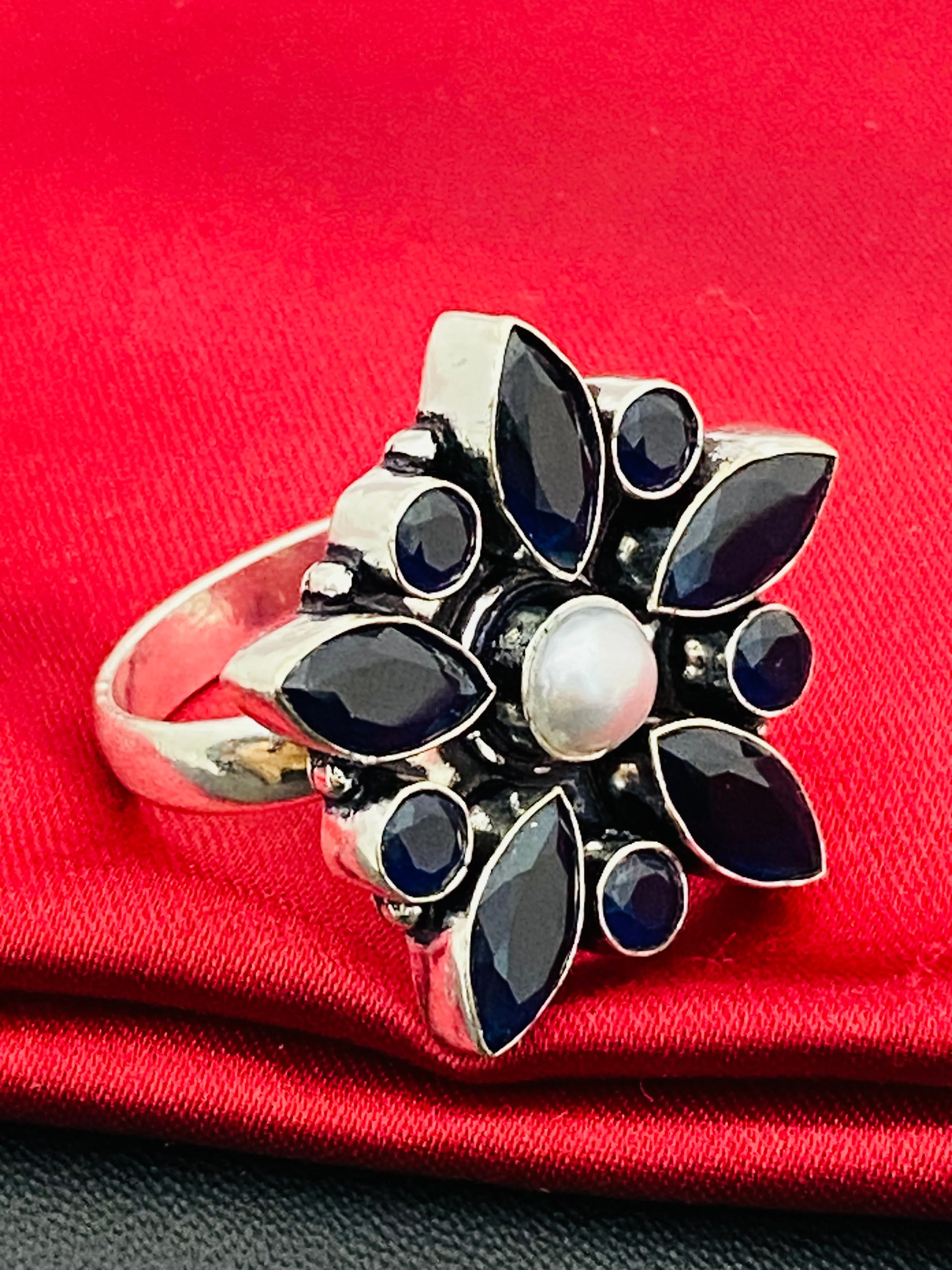 Alluring Black Stone Studded Floral Designed Adjustable Rings With Pearl Bead